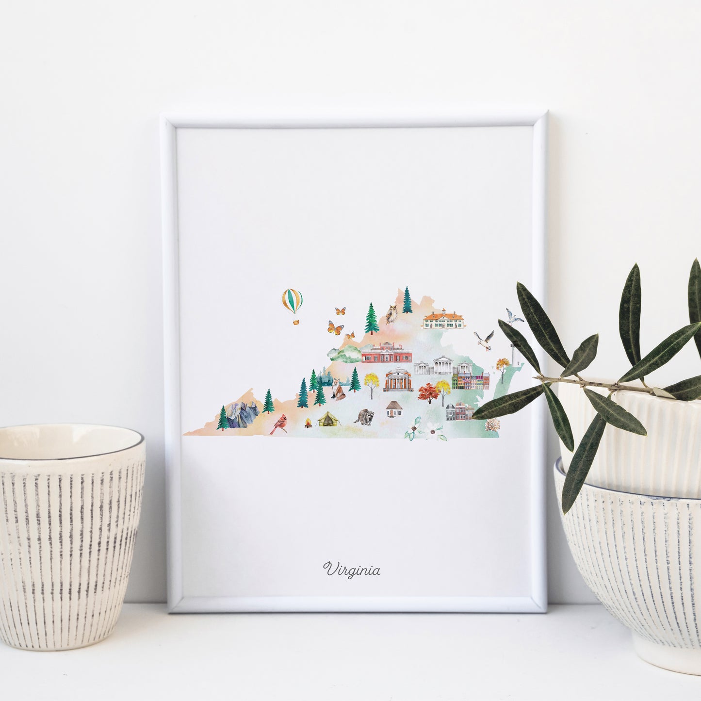 a framed illustration of Virginia, with various landmarks and scenes depicted in a colorful and detailed manner.