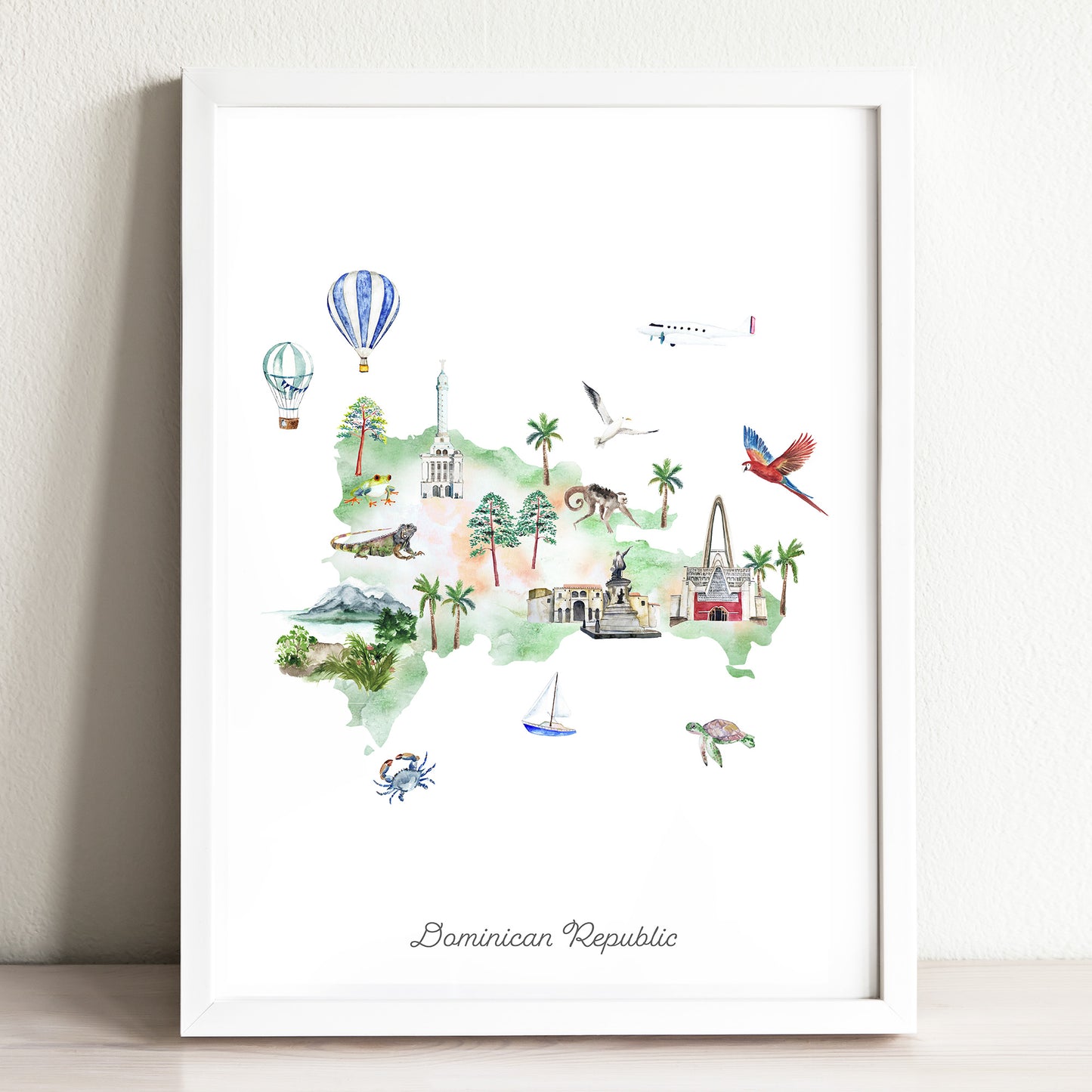 The image is a framed watercolor illustration depicting various landmarks and symbols associated with the Dominican Republic, including hot air balloons, palm trees, a statue, and a bird.