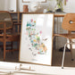 a framed illustration of California, showcasing various landmarks and scenes from the state.